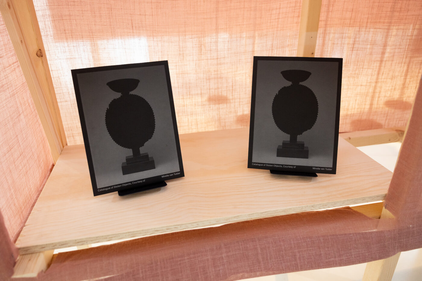 Catalogue of Stolen Objects, Courtesy of (2025) by Mirelle van Tulder from the exhibition Shapeshifters: On Wounds, Wonders and Transformation (2025) at Framer Framed, Amsterdam. Photo: © Maarten Nauw / Framer Framed.