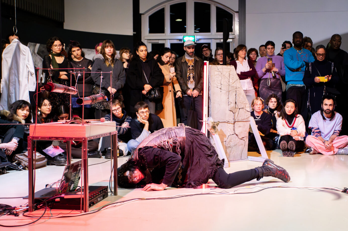 Performance 'The Burial of a Brown Goose' by buulbuul at the opening of Between Fires – Irradiated Imaginations & Anti-Nuclear Solidarities (2026) at Framer Framed, Amsterdam. Photo: © Marlise Steeman / Framer Framed