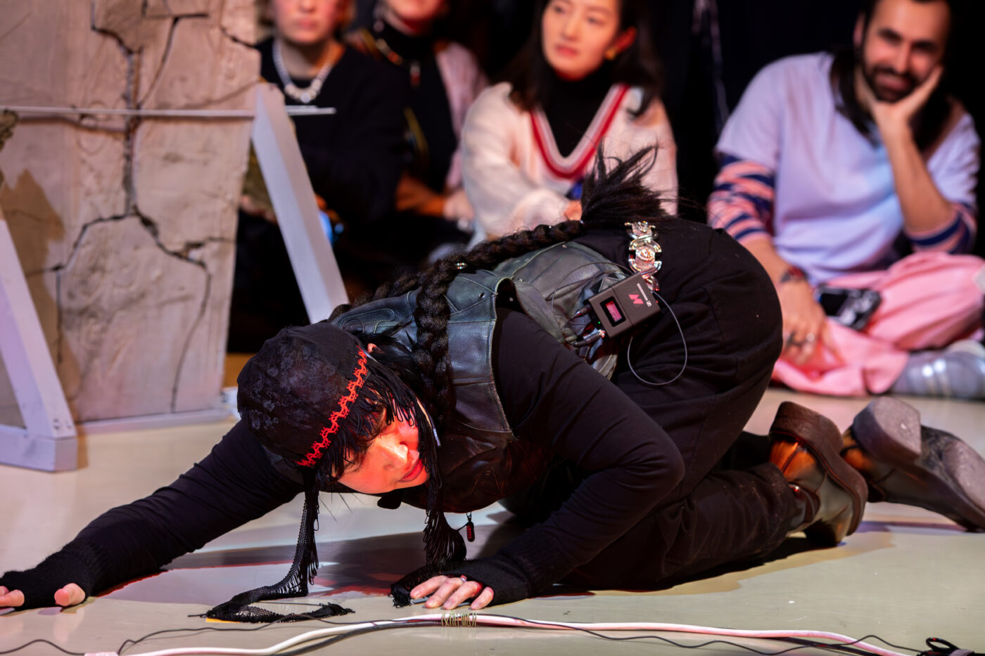 Performance 'The Burial of a Brown Goose' by buulbuul at the opening of Between Fires – Irradiated Imaginations & Anti-Nuclear Solidarities (2026) at Framer Framed, Amsterdam. Photo: © Marlise Steeman / Framer Framed