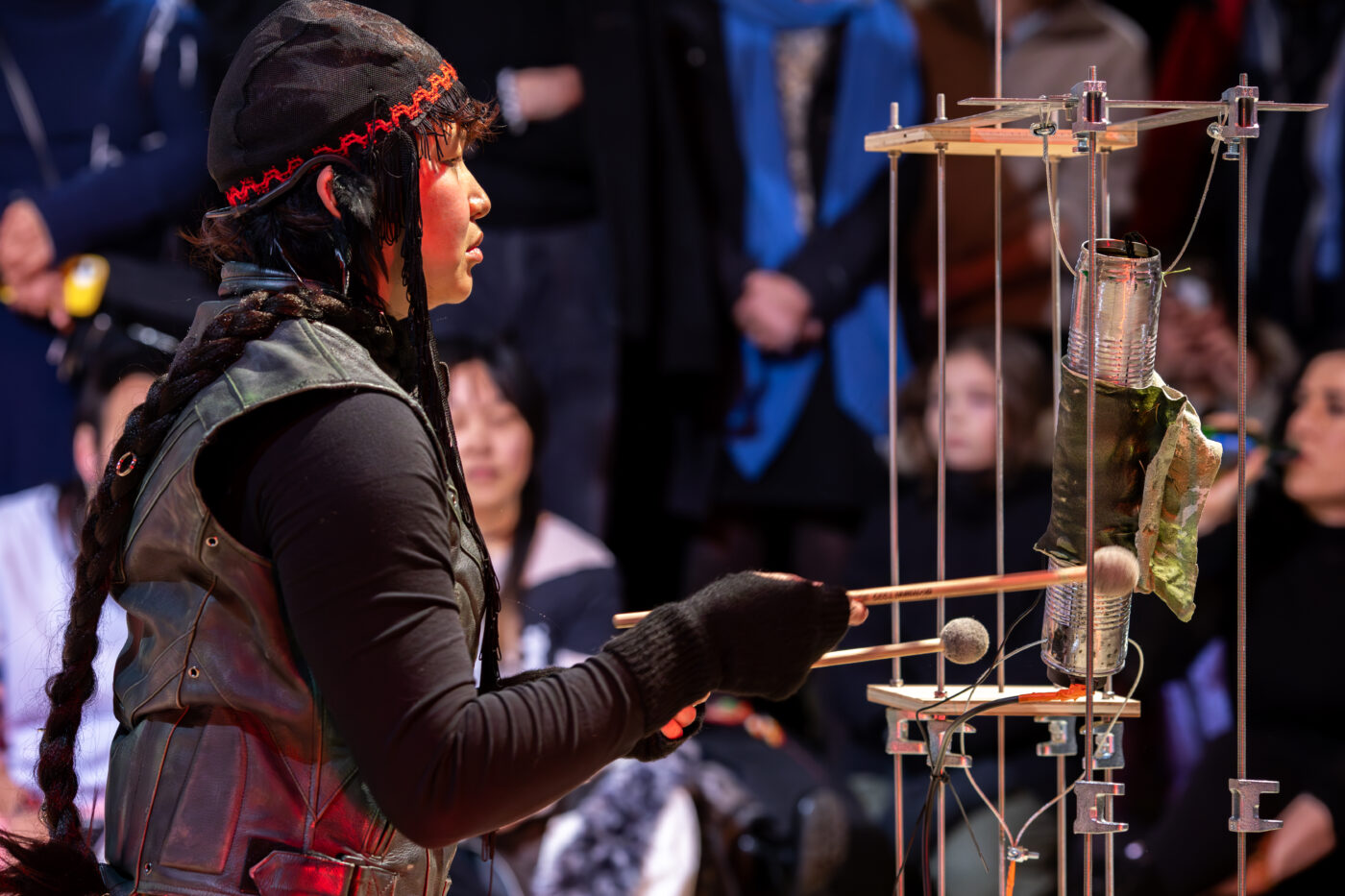 Performance 'The Burial of a Brown Goose' by buulbuul at the opening of Between Fires – Irradiated Imaginations & Anti-Nuclear Solidarities (2026) at Framer Framed, Amsterdam. Photo: © Marlise Steeman / Framer Framed