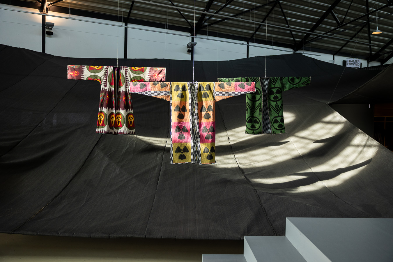 Installation photo of Between Fires – Irradiated Imaginations & Anti-Nuclear Solidarities (2026) at Framer Framed, Amsterdam. Photo: © Maarten Nauw / Framer Framed