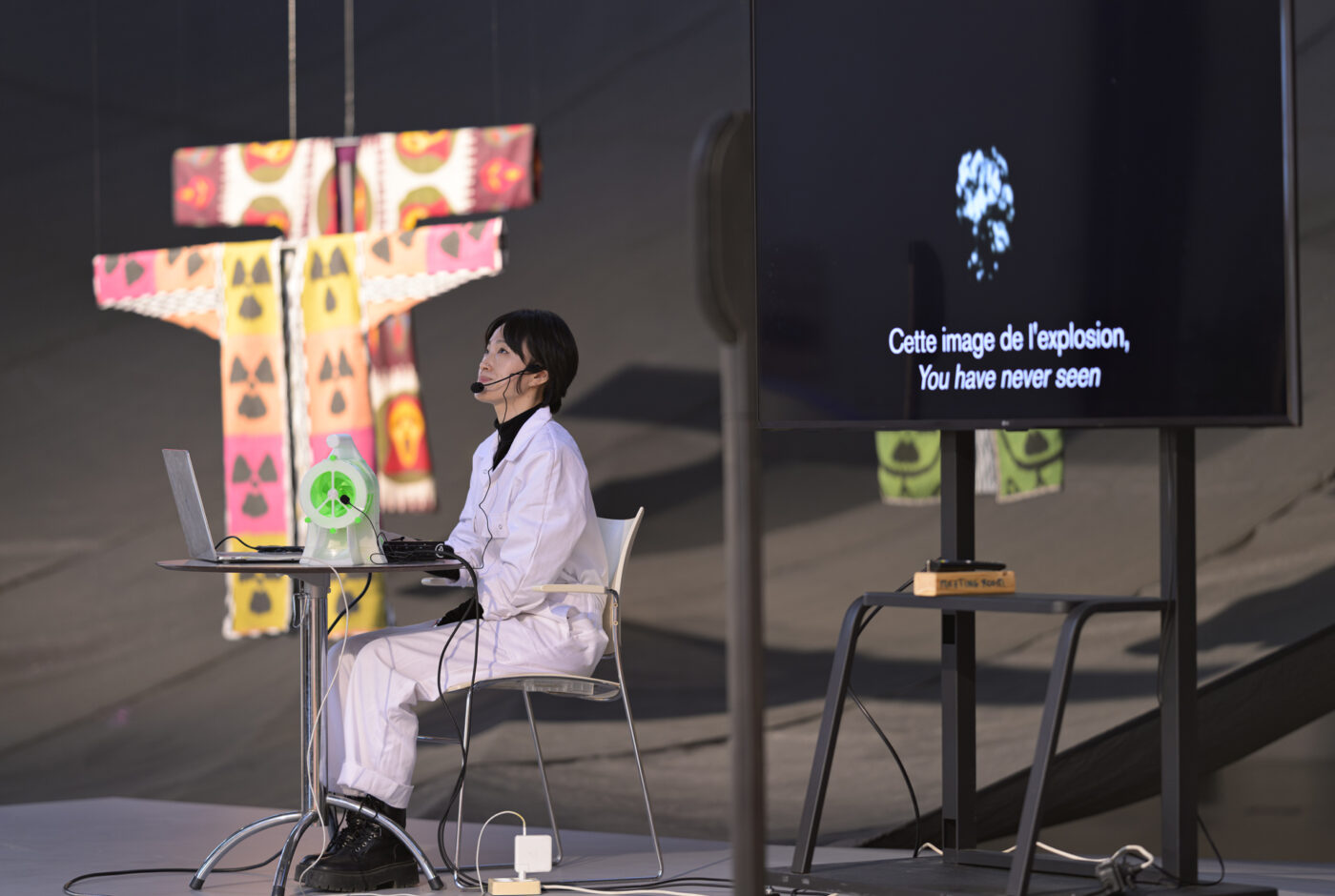 Performance Xiren v.0. by Yeon Sung. Nuclear Histories and Protest Movements during the exhibition Between Fires (2026) curated by Fabienne Rachmadiev at Framer Framed, Amsterdam. Photo: © Pieter Kers / Framer Framed.